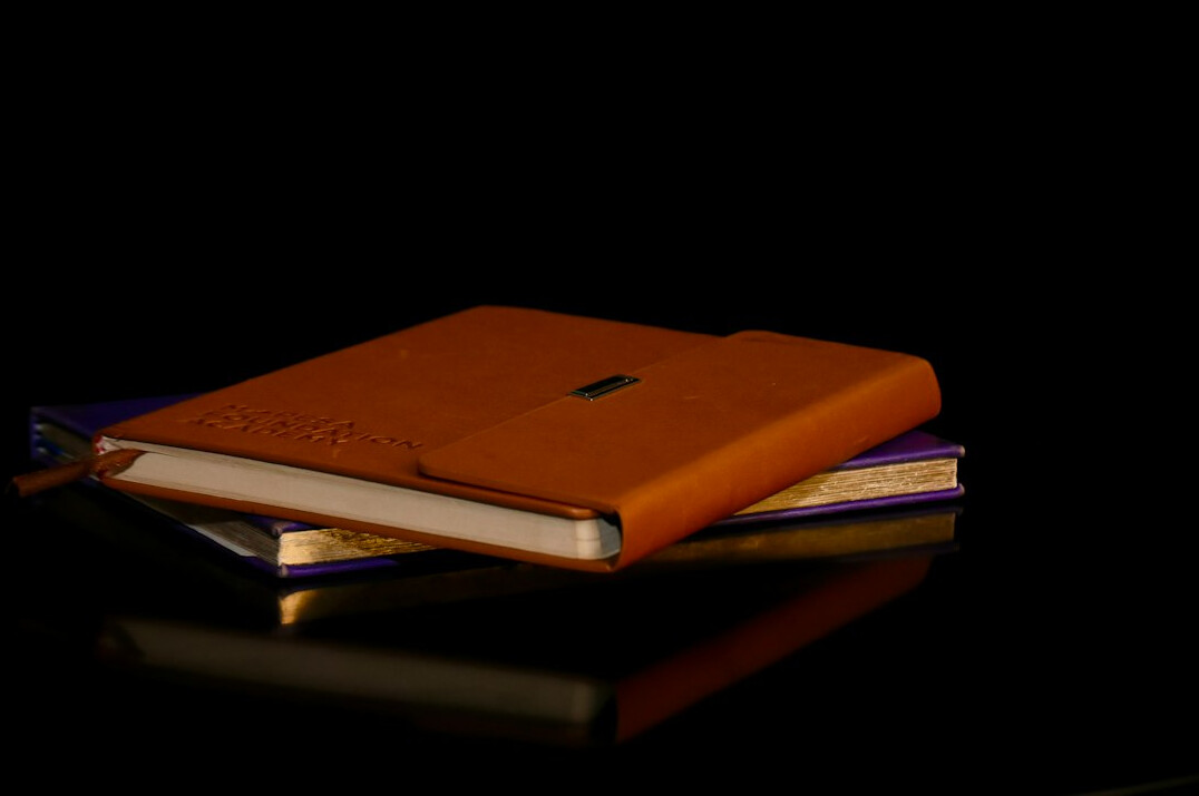 Notebook and pen on a desk