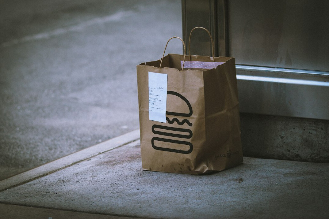 shoplifter hiding items in bag
