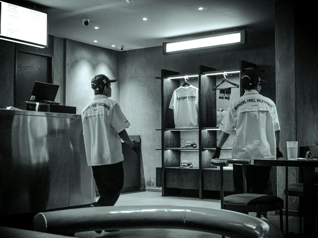 store security guard watching customers
