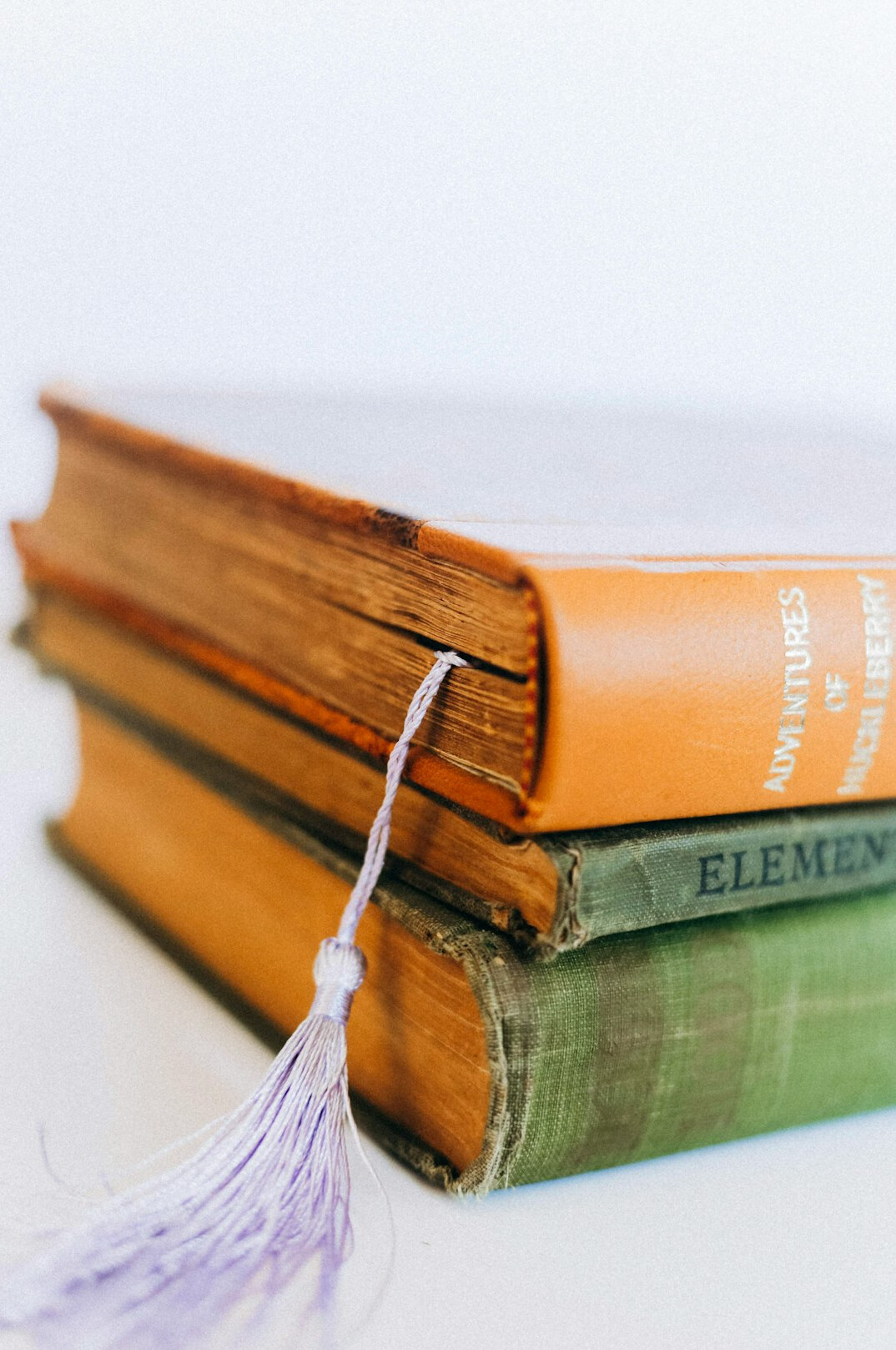 Stack of antique leather-bound books